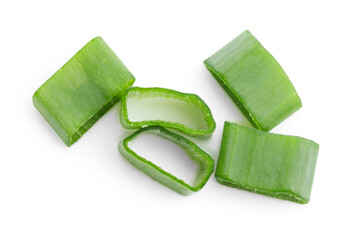 Obraz premium Pieces of green onion isolated on white, top view