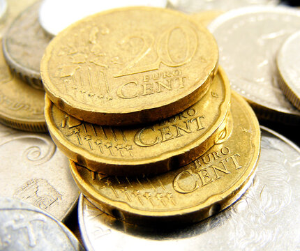 A close-up of a 20 euro cent coin