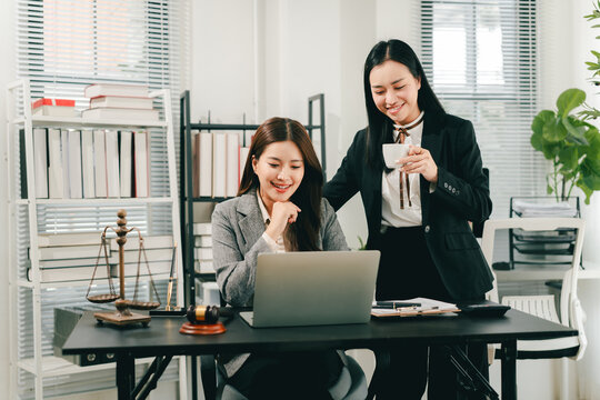 A female lawyer who trains and mentors new employees at the law firm.