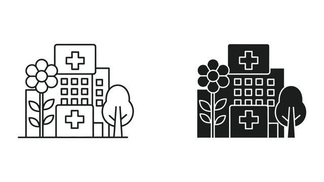 A medical building with a cross symbol and trees around it