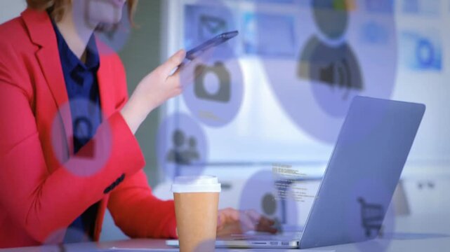 Woman using tech reaching for smartphone and dictating while referencing laptop, app icons floating