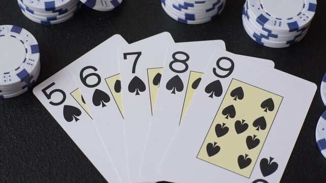 Playing cards and chips on a table, a gambling game of poker. Cards and chips on a gaming table as a background for your design