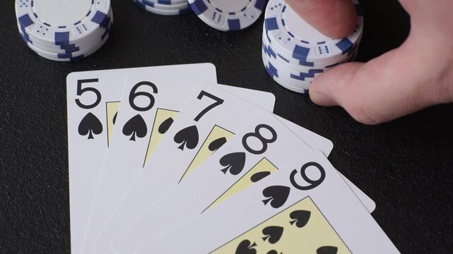 Playing cards and chips on a table, a gambling game of poker. Cards and chips on a gaming table as a background for your design