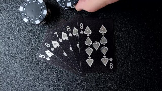Playing cards and chips on a table, a gambling game of poker. Cards and chips on a gaming table as a background for your design