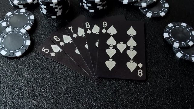 Playing cards and chips on a table, a gambling game of poker. Cards and chips on a gaming table as a background for your design