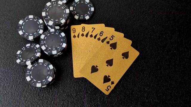 Playing cards and chips on a table, a gambling game of poker. Cards and chips on a gaming table as a background for your design