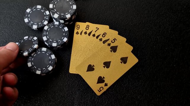 Playing cards and chips on a table, a gambling game of poker. Cards and chips on a gaming table as a background for your design