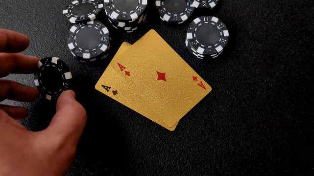 Playing cards and chips on a table, a gambling game of blackjack or baccarat. Cards and chips on a gaming table as a background for your design