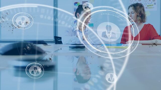 Vertical video: Team reviewing business chart at table man pointing sparking HUDs flooding frame