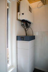 Home battery energy storage system with blue LED status display, residential energy independence solution, thuisbatterij with solar inverter © René Notenbomer