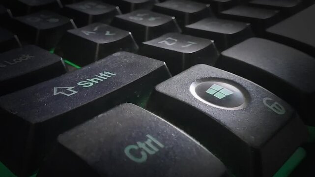 Hand on keyboard with Ctrl + A is toggling on and off animation. Finger pressing Ctrl + A command on the keyboard.