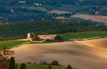 Fototapeta premium Vitaleta chapel and Val d'Orcia landscape in Tuscany, San Quirico,d Orcia Italy.