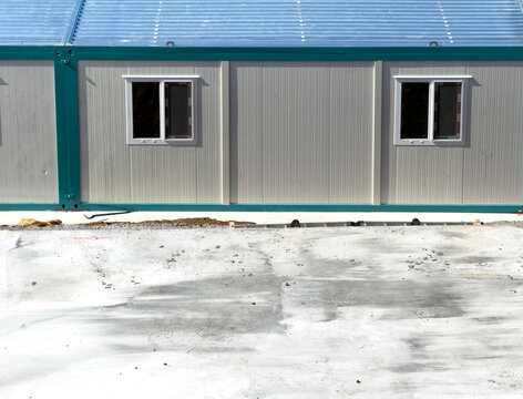 Prefabricated industrial container with windows