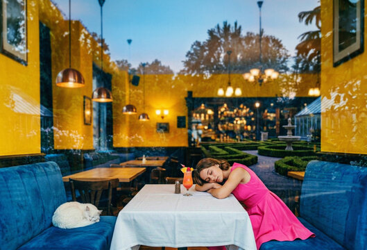 Serene moment in city bistro with reflections