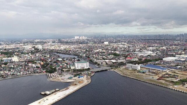 Aerial view of urban sprawl and river system in a developing city