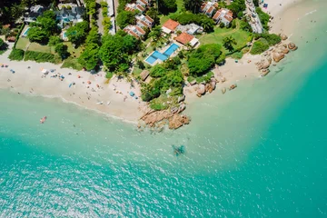Sandy beach with villas and turquoise ocean in Florianopolis, Brazil. Aerial view © artifirsov