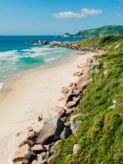 Scenic beach, rocks and ocean on sunny day in Brazil. Drone view of Praia da Galheta © artifirsov
