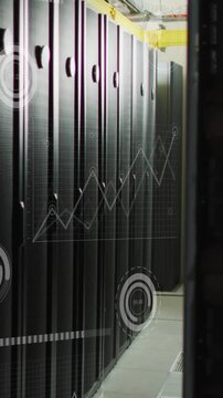 Vertical video: Server racks opening datacenter aisle as camera sliding, chart nodes rising for ops