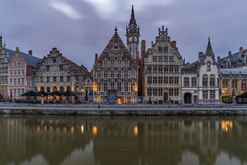 Fototapeta premium Medieval guild houses on Graslei quay reflected in the Leie river, Ghent, Belgium.