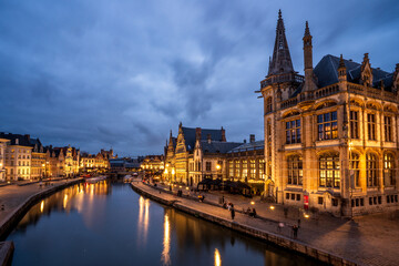 Fototapeta premium Night view of Graslei quay and the Old Post Office in Ghent, Belgium.