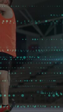 Vertical video: Athlete taking step, pushing running blade for balance in arena with teal overlay