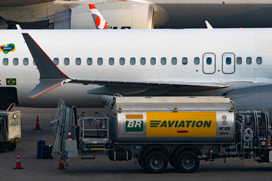 GUARULHOS - BRAZIL - March 31 2024 - Tanker truck, operated by BR Aviation, refueling a Gol Linhas Aereas' Boeing 737 MAX 8 with jet A fuel at Guarulhos International Airport.