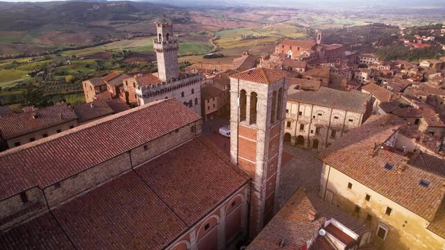 Montepulciano Italy Drone Video, Cinematic Aerial Flyover above Towers and Piazza Grande, Scenic Tuscan Valley Landscape at Golden Hour Morning, Historic Architecture Travel Landmark 4K