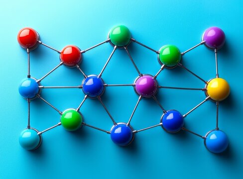 A miniature network consisting of thumbtacks and string, with an assortment of vibrant pins interconnected by string set against a light-hued backdrop, implying a complex web of connections