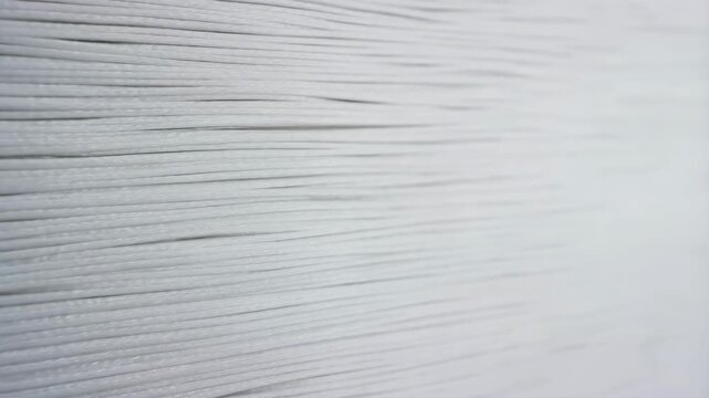 Fibers fine white threads texture abstract background macro, representing delicate materials and structure for design elements, backgrounds, and
