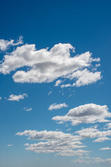Fototapeta premium Blue sky with white clouds, cirrus, cumulus, stratus and nimbus.