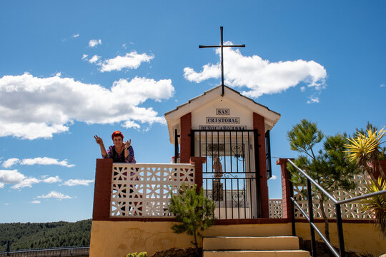 Cheerful woman at the hermitage of San Cristobal in Bu&ntilde;ol, Valencian Community