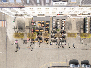 Obraz premium Brussels, Belgium. Aerial top-down drone view of outdoor cafes at Place du Luxembourg. After work drink.
