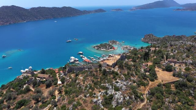 Aerial panoramic view of Kalek&ouml;y village with Simena Castle, turquoise Kekova lagoon and surrounding islands, Antalya, Turkey