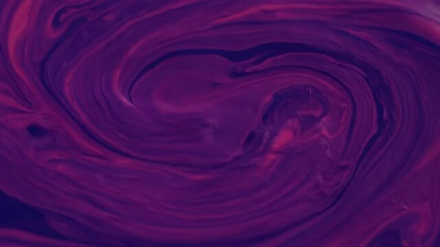 Swirling, abstract, magenta, and indigo colors create a fluid, dreamlike effect