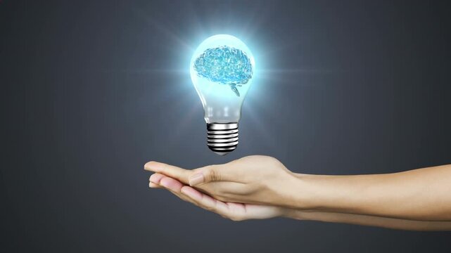 Animation of human brain spinning in a light bulb icon over cupped hands against grey background