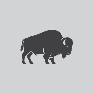 Bison silhouette with a dark gray silhouette of a bison against a light gray
