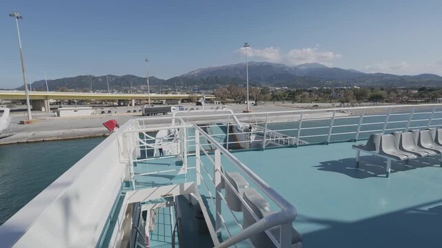 Ro-ro ferry ramp closing during departure from organized port terminal