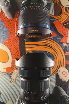 Wroclaw, Poland - February 1 2025: Canon RP with Laowa 10mm Lens and Panasonic Lumix S5 II with 14-28mm Wide Angle Lens Professional Mirrorless Cameras for Photography Comparison 