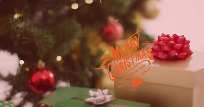 Animation of christmas greetings text over christmas presents and decorations
