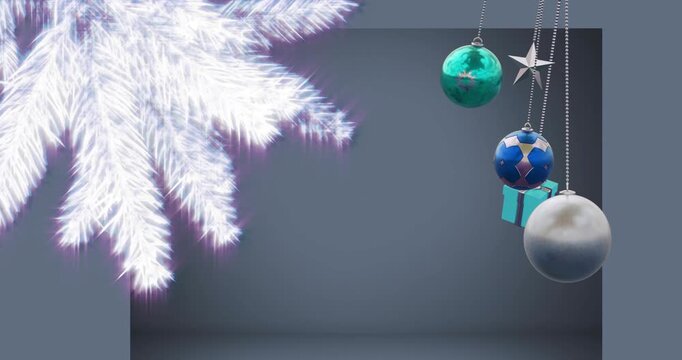 Animation of hanging baubles, gift box with illuminated pine tree against gray background