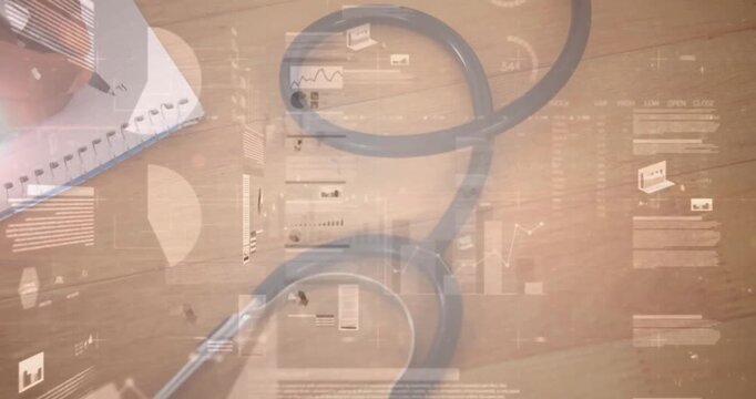 Medical student writing in notebook on desk with stethoscope, showing animated graphs, charts