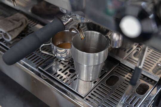 Espresso machine preparing coffee, barista workspace and cafe equipment