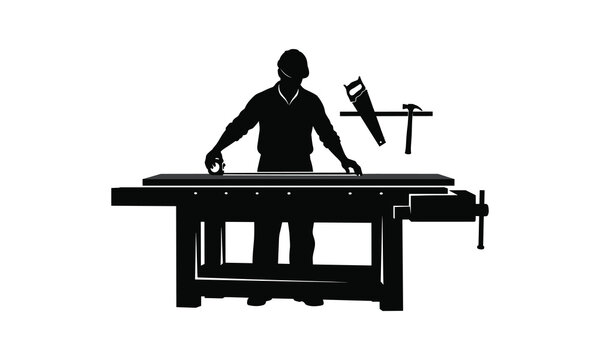 Worker operating a large industrial planer machine in a workshop setting