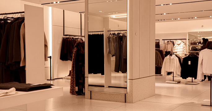 Modern clothing store interior showcasing fashion apparel, retail display, shopping experience, and boutique style