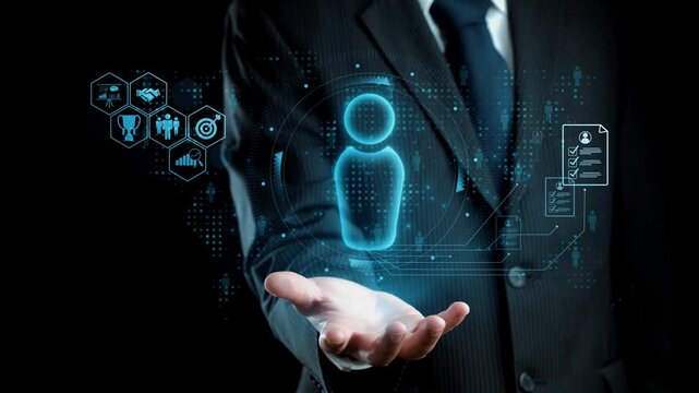 A businessman in a suit stands with an open hand displaying a holographic interface, symbolizing the fusion of digital technology and traditional business practices. Qubit