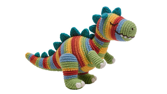 Handmade rainbow striped crochet dinosaur toy, isolated on transparent background