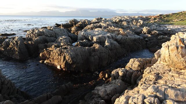 Rocky coastline of DeKelders overlooking the Atlantic Ocean, South Africa