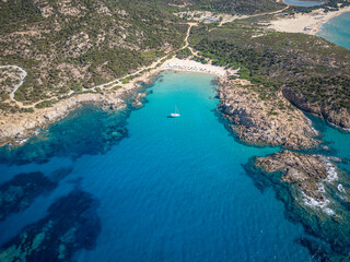 Fototapeta premium Scenic aerial of Cala Cipolla beach at sunset