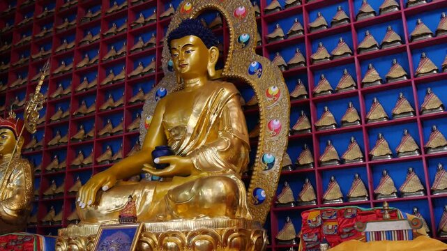 The interior of one of the many Buddhist temples in Mongolia. Bronze figures of deities and saints.