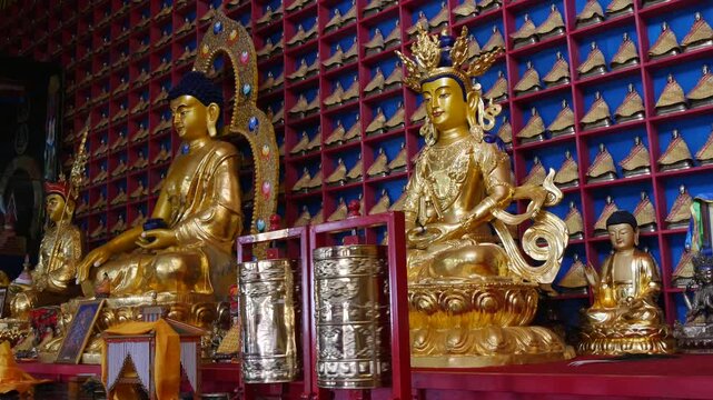 The interior of one of the many Buddhist temples in Mongolia. Bronze figures of deities and saints.